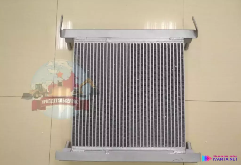 "Радиатор масляный VOE 11890332 Volvo BL71 "